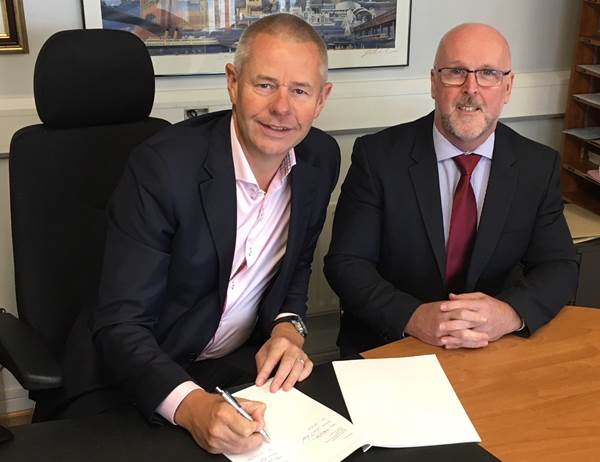 Western Motors managing director, James McCormack (left) with David Smith, After-Sales Manager for Mercedes-Benz commercial vehicles.)
